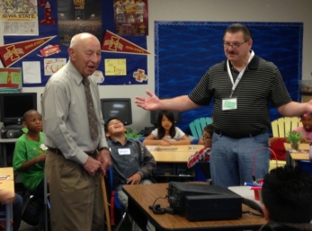 David Collingham greets Mr. Malory, retired teacher from the Fontana High School, who mentored David while he got his ham radio license. He came to see Ham Radio back in the classroom 40 years after he started it at Fontana High School.